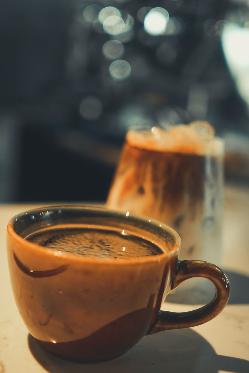 CLOSE-UP OF COFFEE SERVED ON TABLE