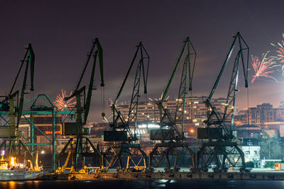 Cranes at night