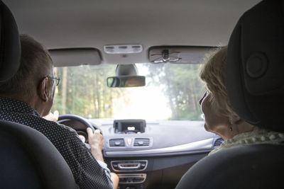 Senior couple in the car