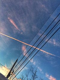 Low angle view of vapor trail in sky