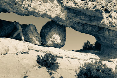 Low angle view of rock formation during winter