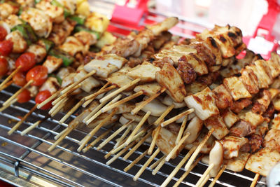 Close-up of meat on barbecue grill