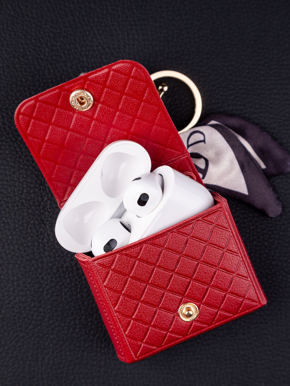 red, studio shot, no people, indoors, fashion accessory, high angle view, coin purse, pink, emotion, black background, heart shape, still life