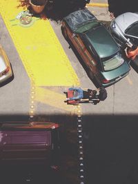 High angle view of yellow car on street