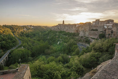 High angle view of buildings against sky during sunset