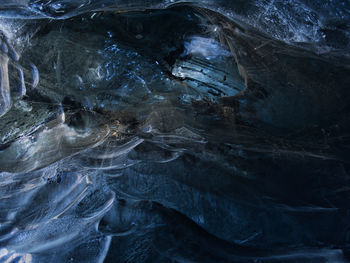 Full frame shot of water flowing through rocks