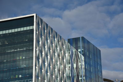 Low angle view of modern building against sky