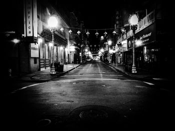 Illuminated street lights at night