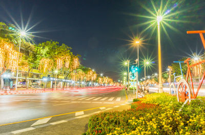 Light trails on city street at night