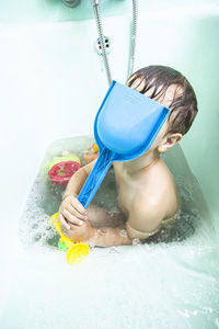 Boy playing in water