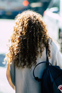 Rear view of woman in winter