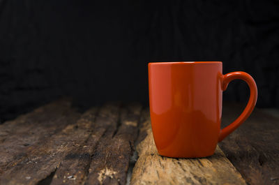 Close-up of coffee cup on table