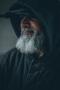 Close-up of man wearing hat