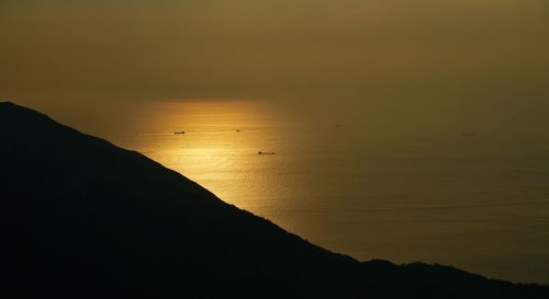 High angle view of calm sea against clear sky