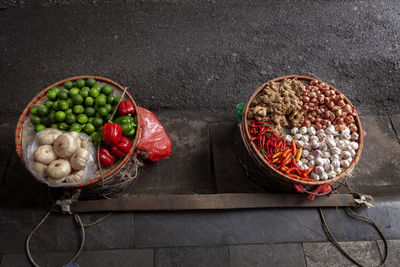 High angle view of fruits in basket on table