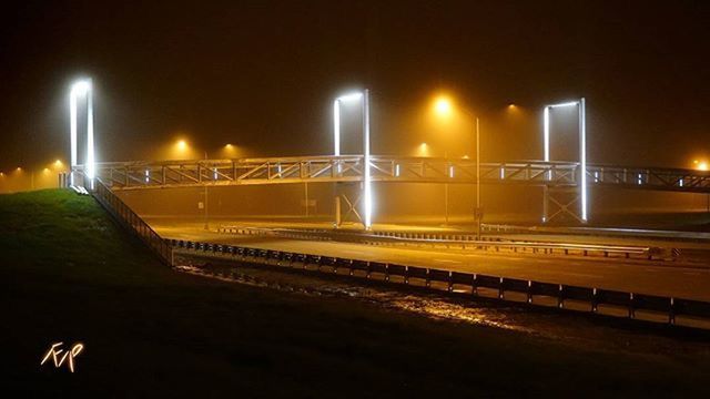 VIEW OF ILLUMINATED STREET LIGHTS