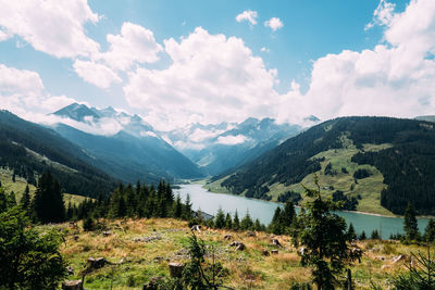 Scenic view of landscape and mountains against sky