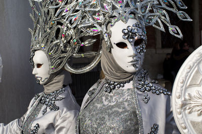 Low angle view of traditional mask on display at store