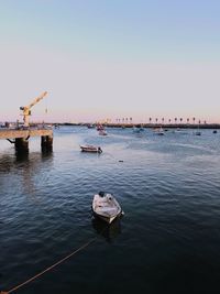 Scenic view of pier on sea against clear sky