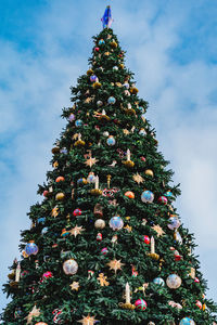 Low angle view of christmas tree against sky