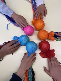 High angle view of people holding hands