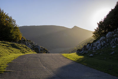 Scenic view of a mountain road against clear sky