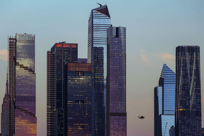 Low angle view of skyscrapers against clear sky