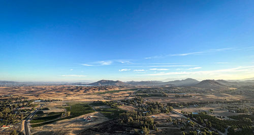 Aerial view of townscape against sky