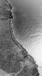 High angle view of groyne on beach