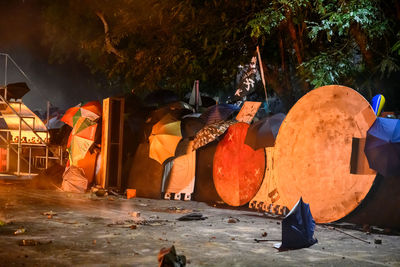 People working on street at night