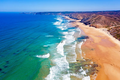 Panoramic shot of sea shore against sky