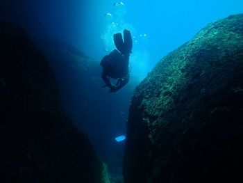 Person swimming in sea