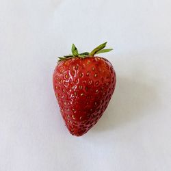 Close-up of strawberry against white background