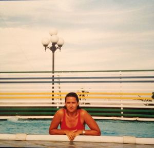 Portrait of cute girl looking at sea