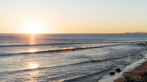 Scenic view of sea at sunset