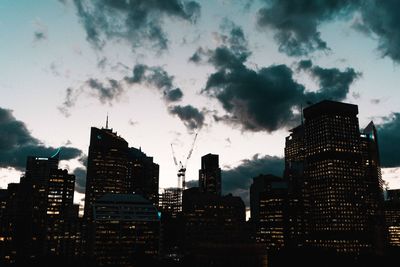 View of buildings against cloudy sky