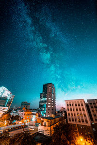 Illuminated buildings in city at night