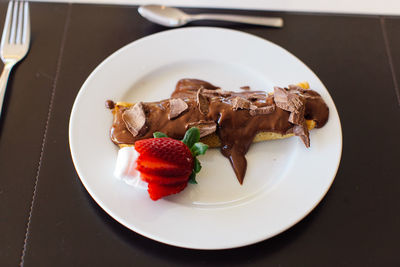 High angle view of cake in plate on table