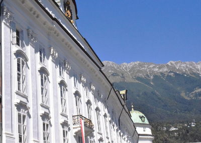 Low angle view of building against blue sky