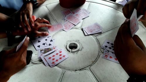 High angle view of person playing on table