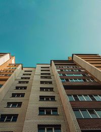 Low angle view of modern building against clear sky