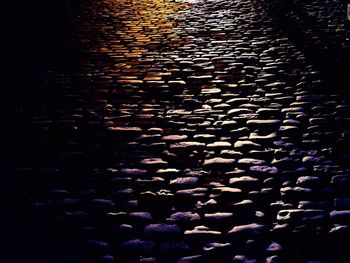 High angle view of people on street at night