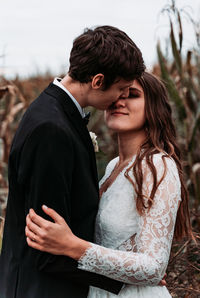 Young couple standing outdoors