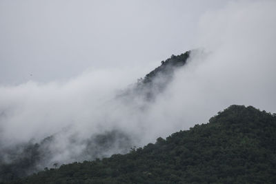 Scenic view of volcanic mountain against sky