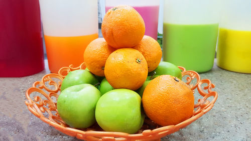 Close-up of oranges in container