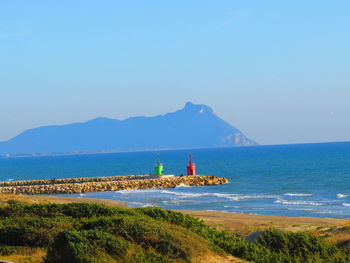 Scenic view of sea against clear sky