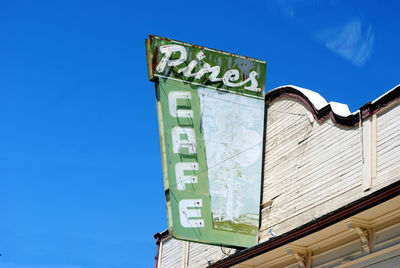 Low angle view of built structure against clear blue sky