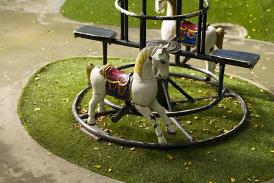 High angle view of bench in park