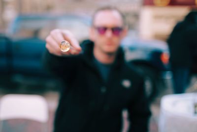 Close-up of young woman in sunglasses