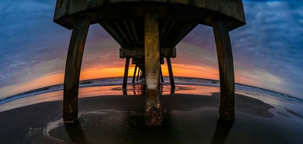 Scenic view of sea at sunset